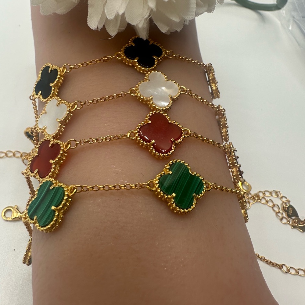 Authentic stone clover bracelets in silver 925 settings.. $55 each..